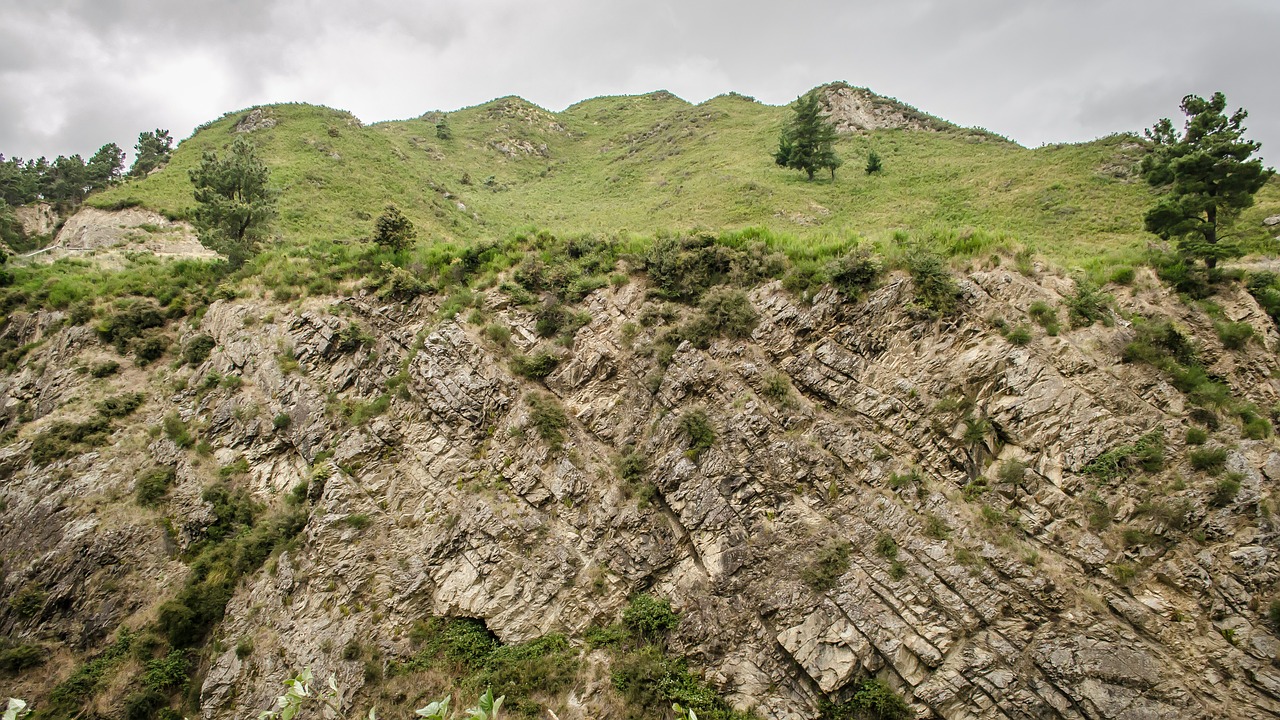 rock mountain clouds free photo