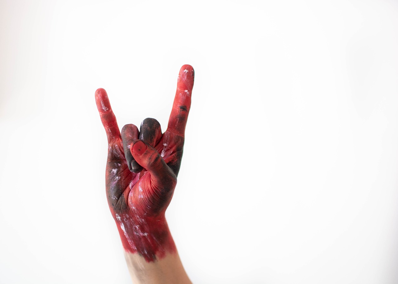 rock and roll  red  hand free photo