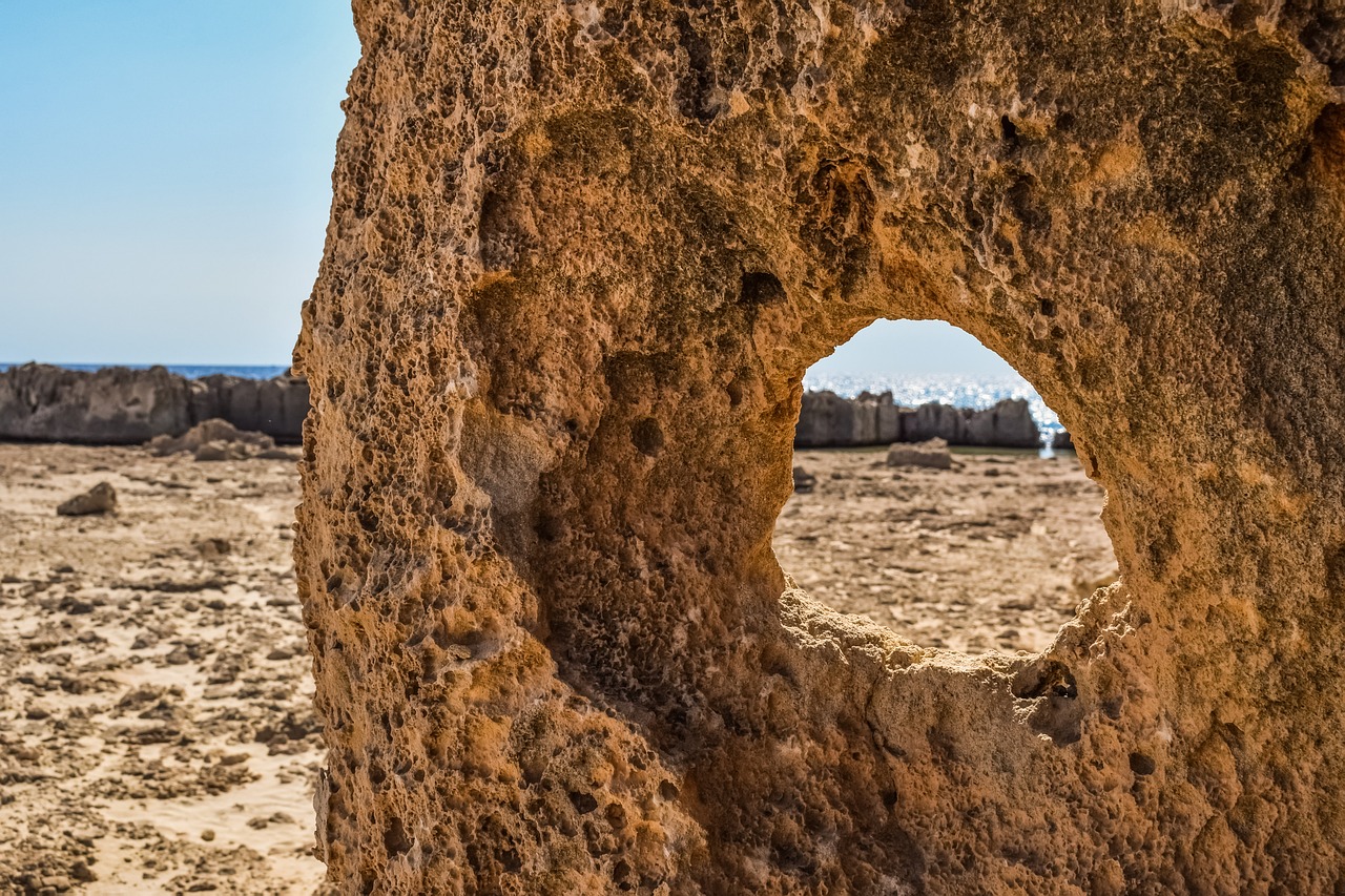 rock formation hole window free photo