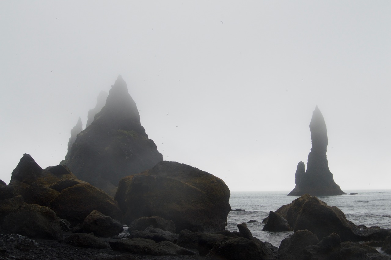 rock formations beach fog free photo