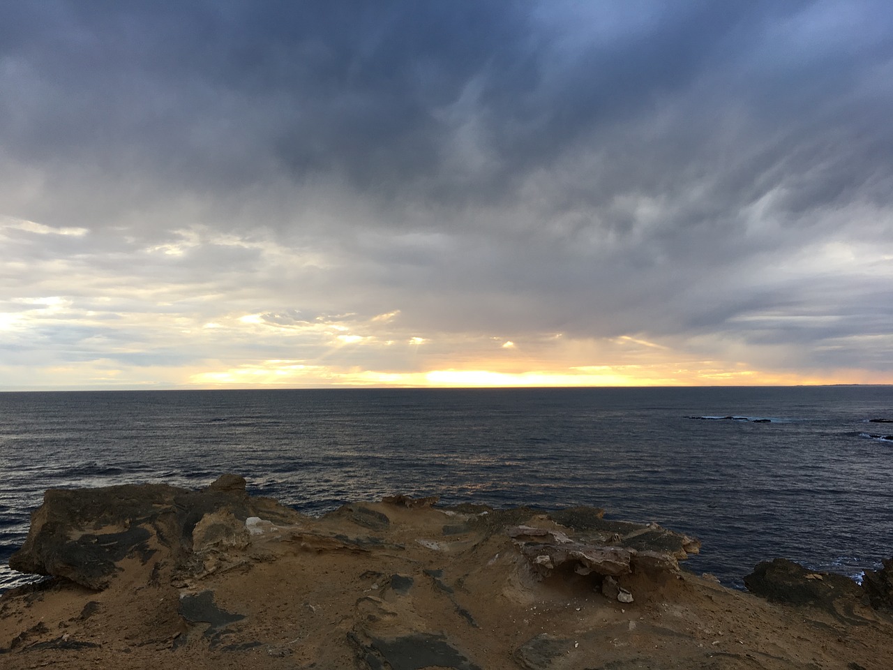 rocks water clouds free photo