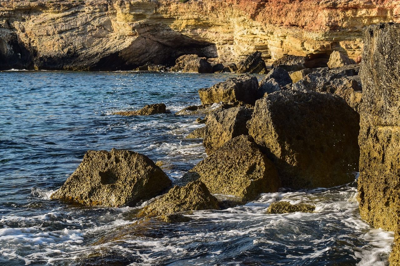 rocks rocky coast wave free photo