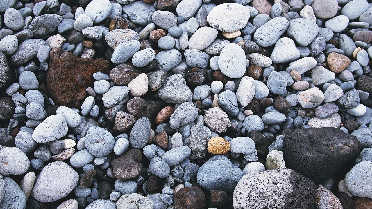 rocks pebbles beach free photo