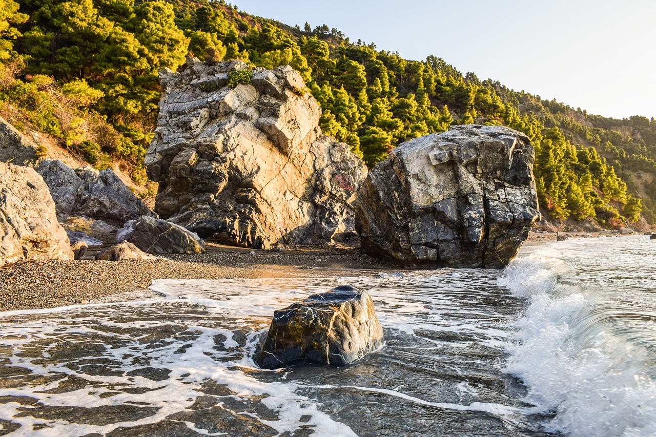 rocks beach wild free photo