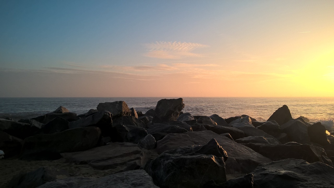 rocks  beach  sunrise free photo