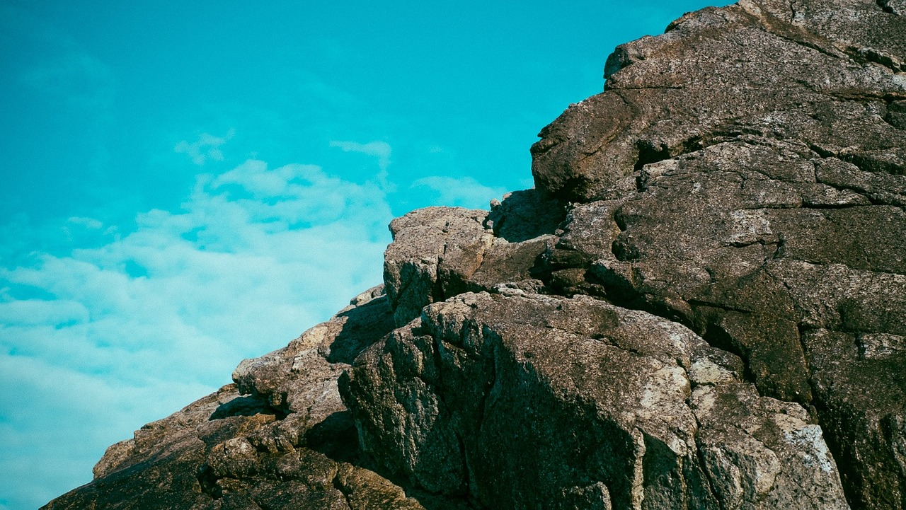 rocks climbing peak free photo