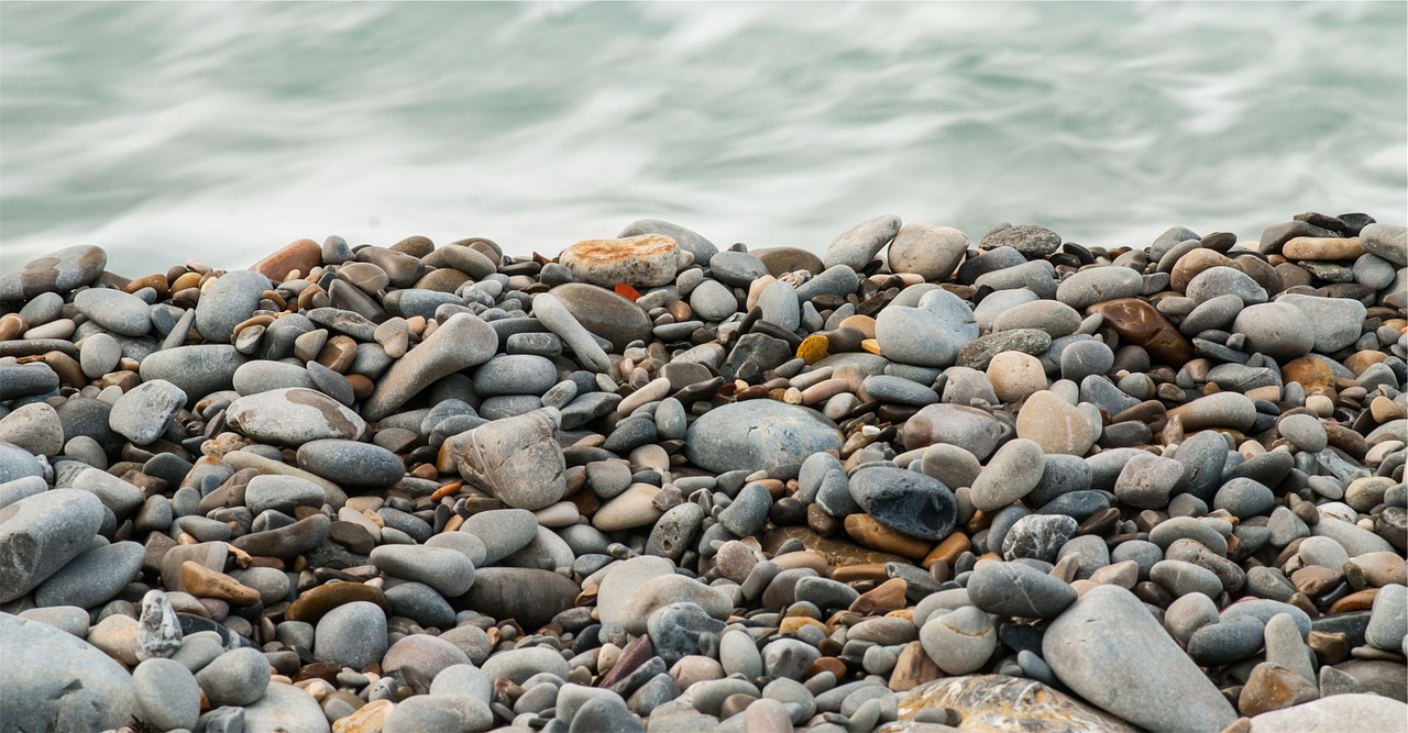 rocks pebbles water free photo