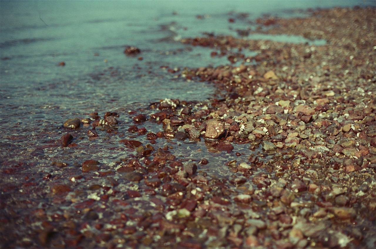 rocks pebbles water free photo