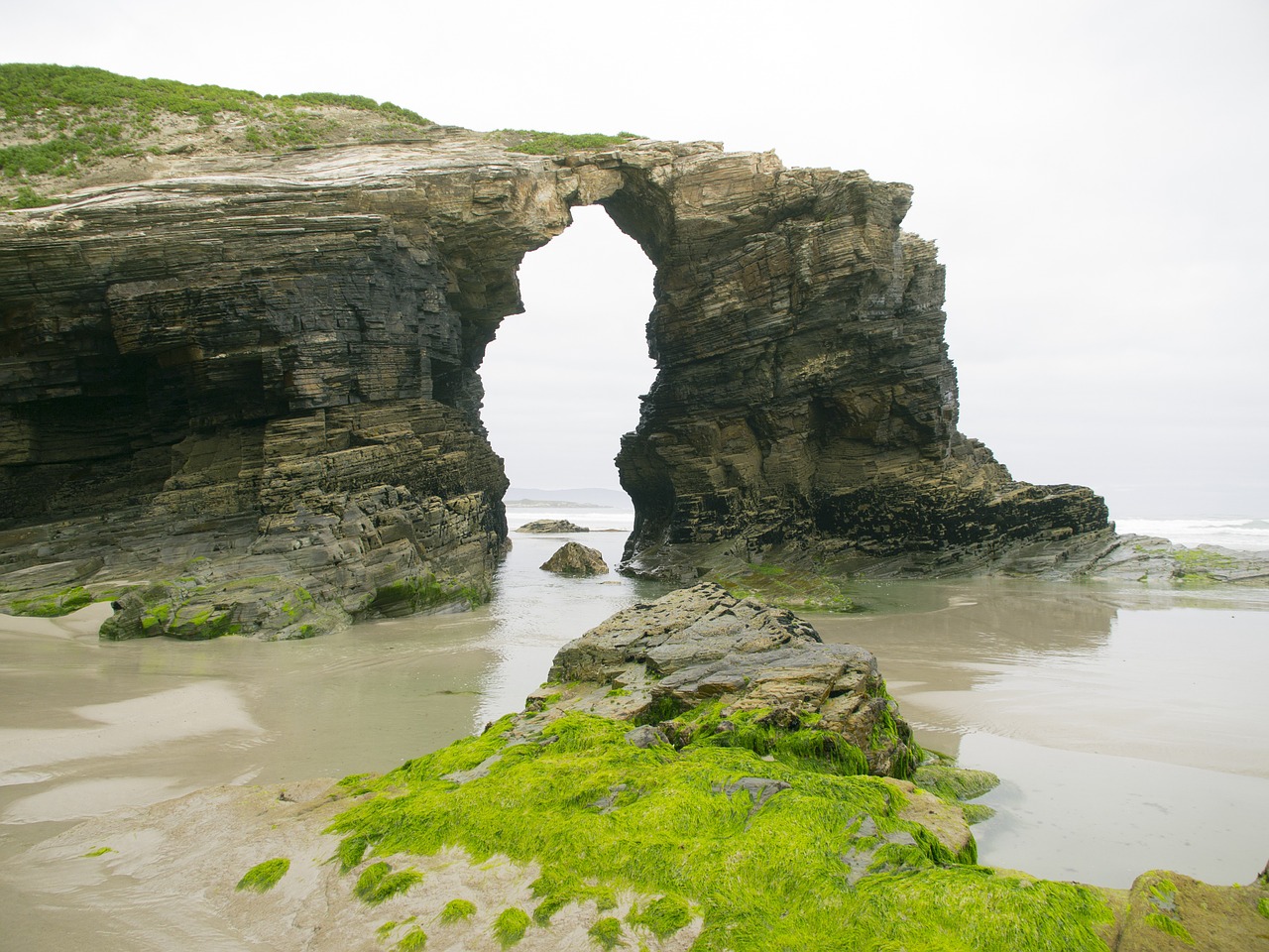 rocks arc cathedrals beach free photo