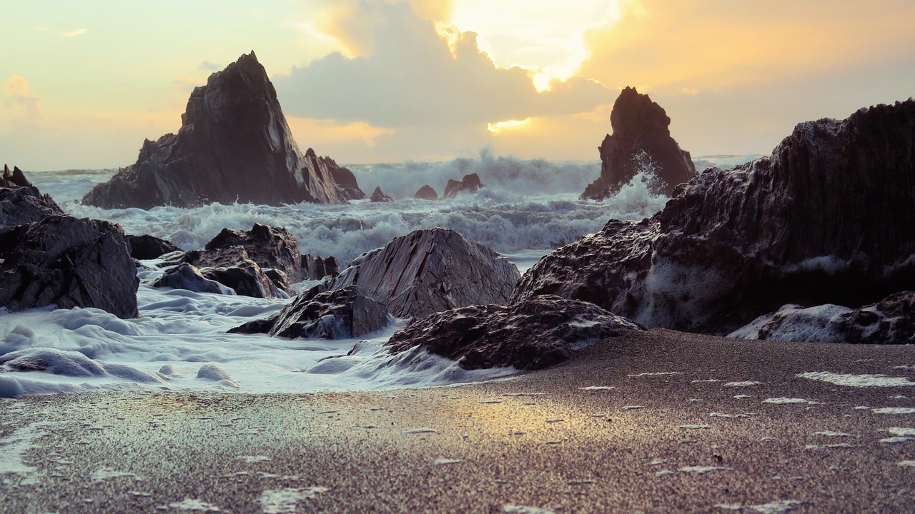 rocks coast sand free photo