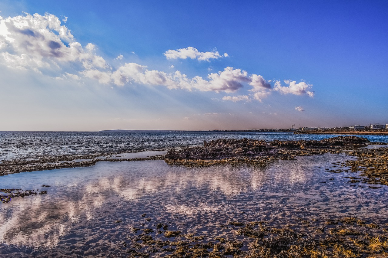 rocky coast sea reflections free photo