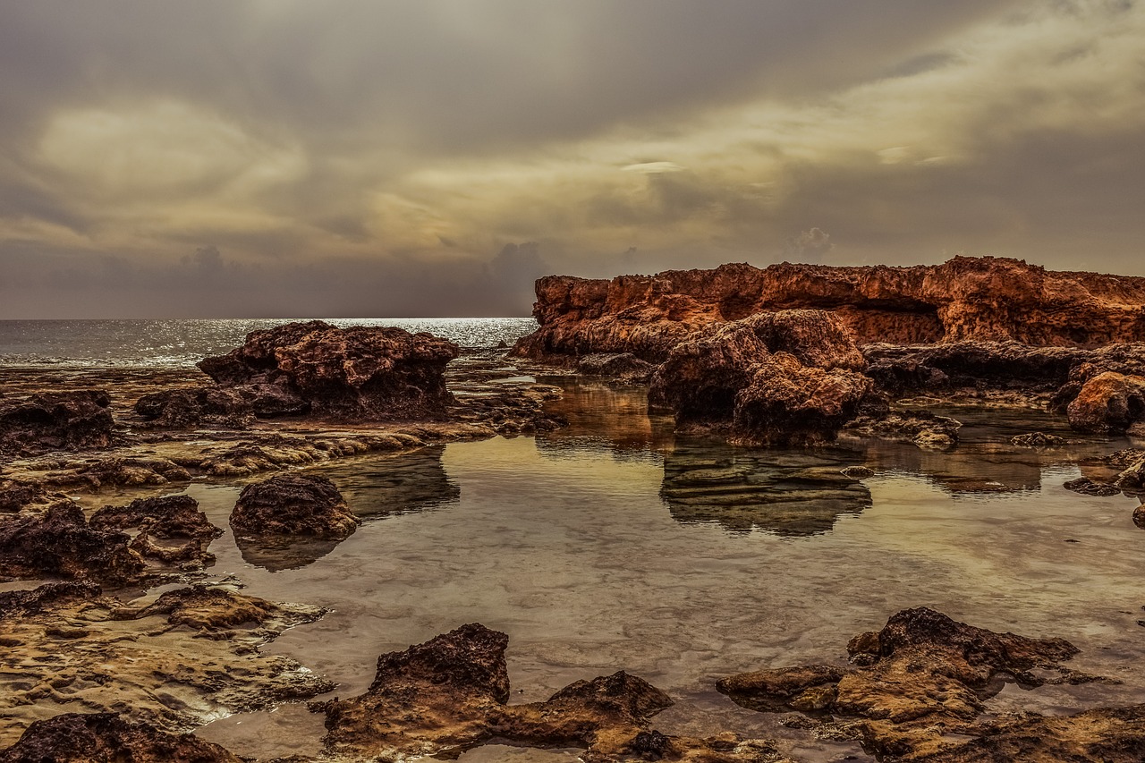 rocky coast lagoon sea free photo