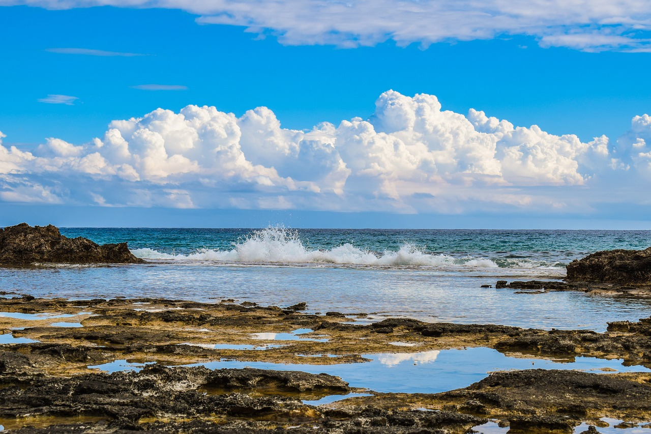 rocky coast wave sky free photo