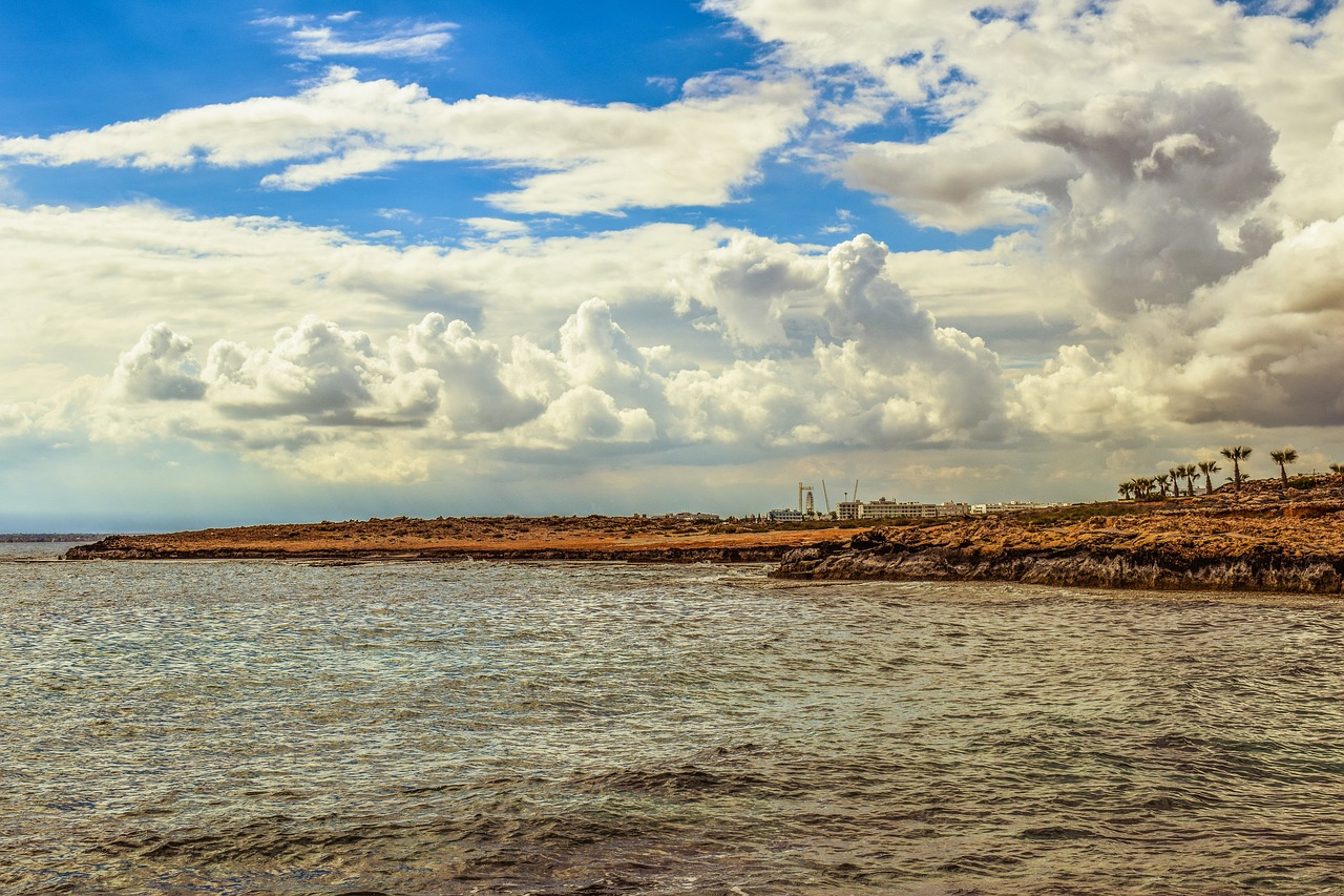 rocky coast sky clouds free photo