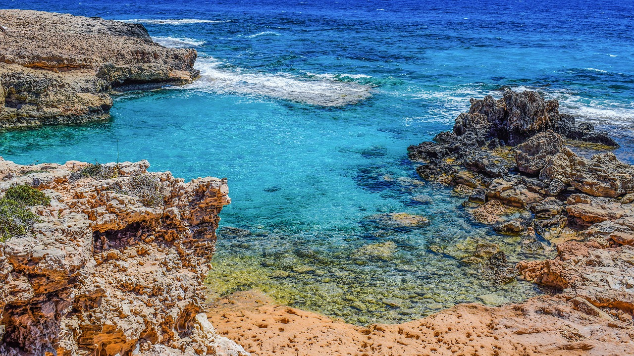 rocky coast lagoon calm free photo