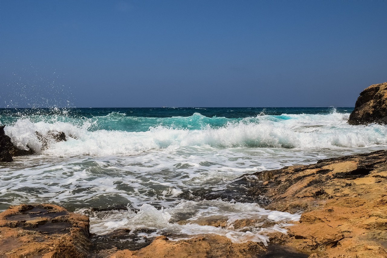 rocky coast sea waves free photo