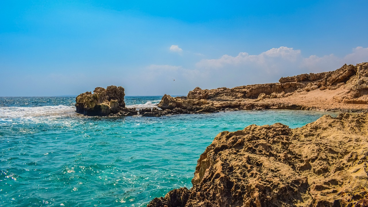 rocky coast sea turquoise free photo