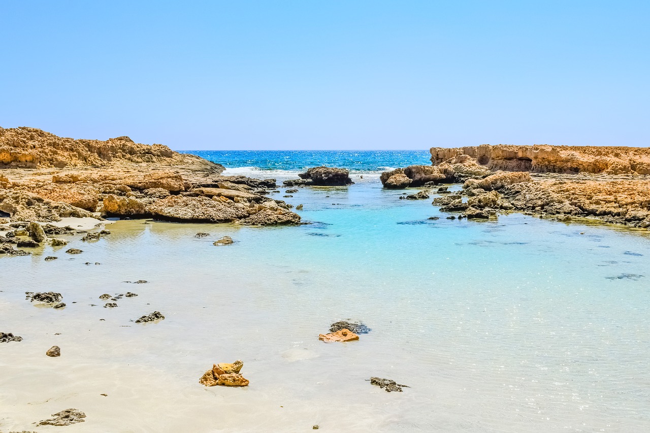 rocky coast lagoon sea free photo