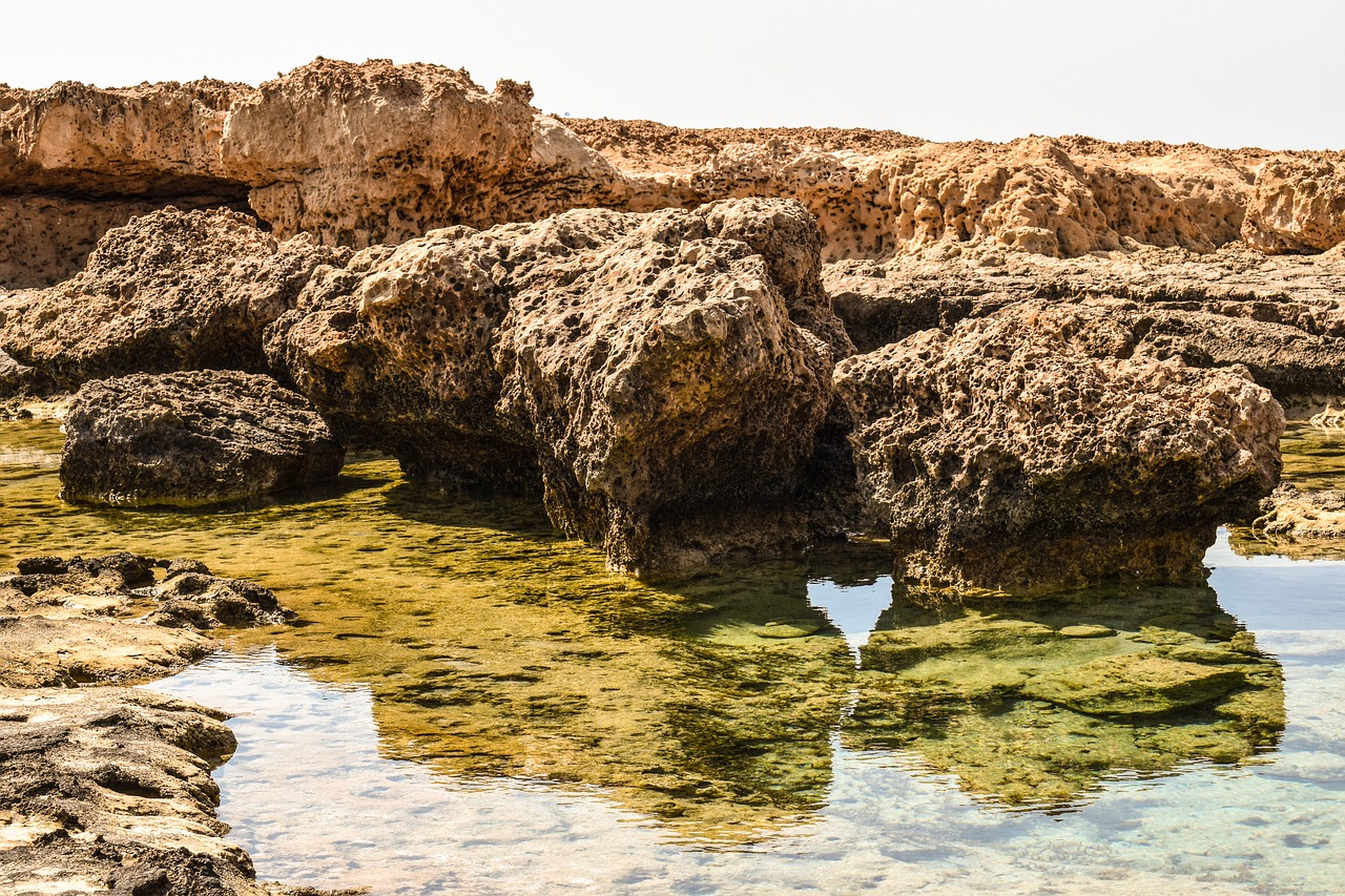 rocky coast lagoon sea free photo