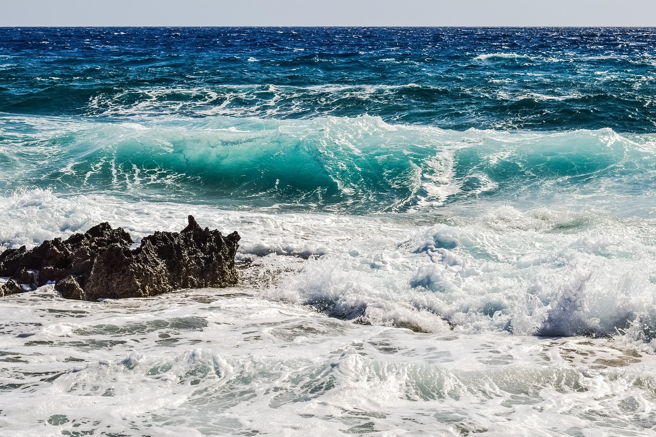 rocky coast wave smashing free photo