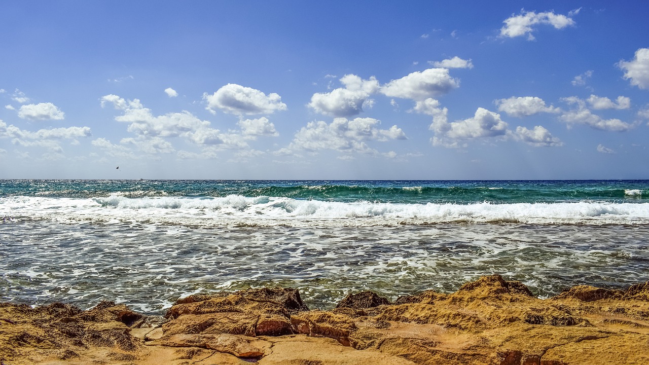 rocky coast sea horizon free photo