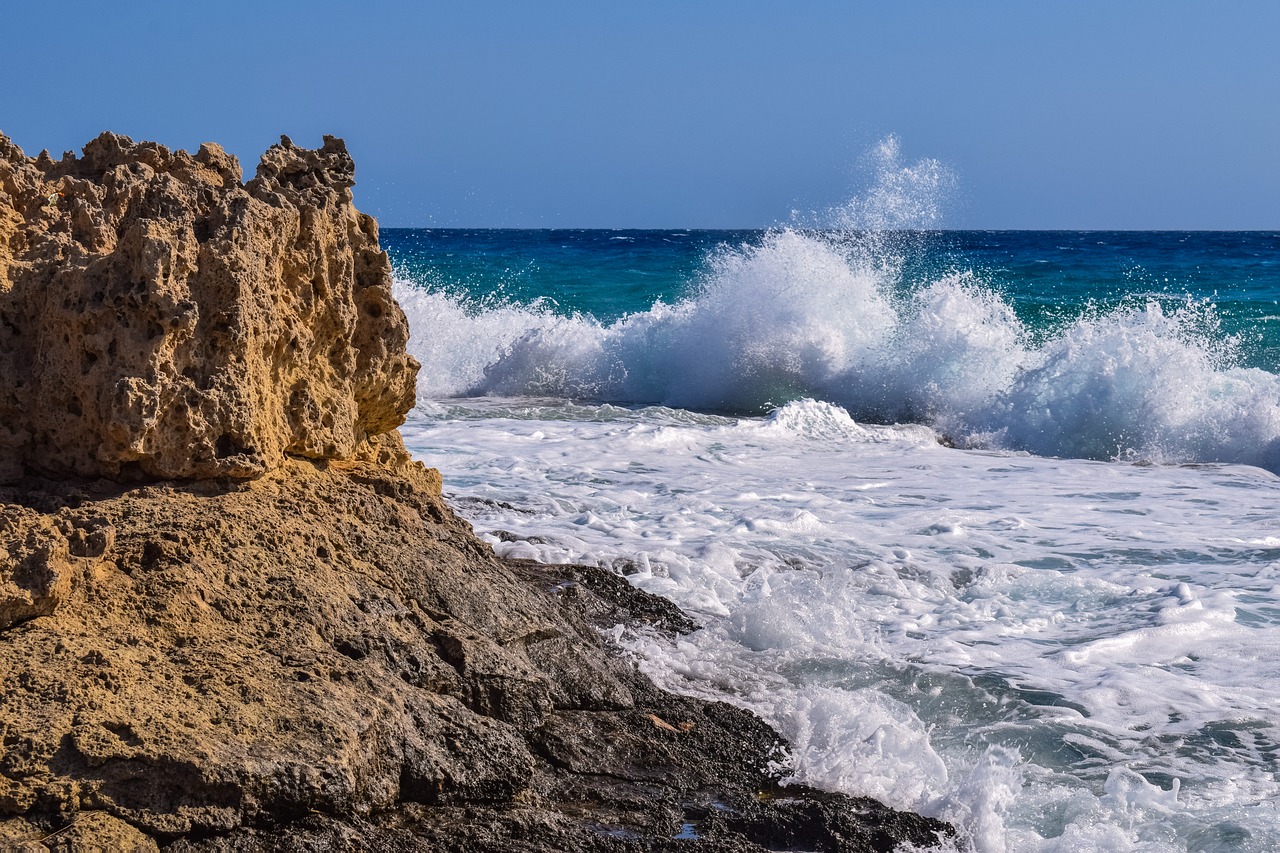 rocky coast wave crashing free photo