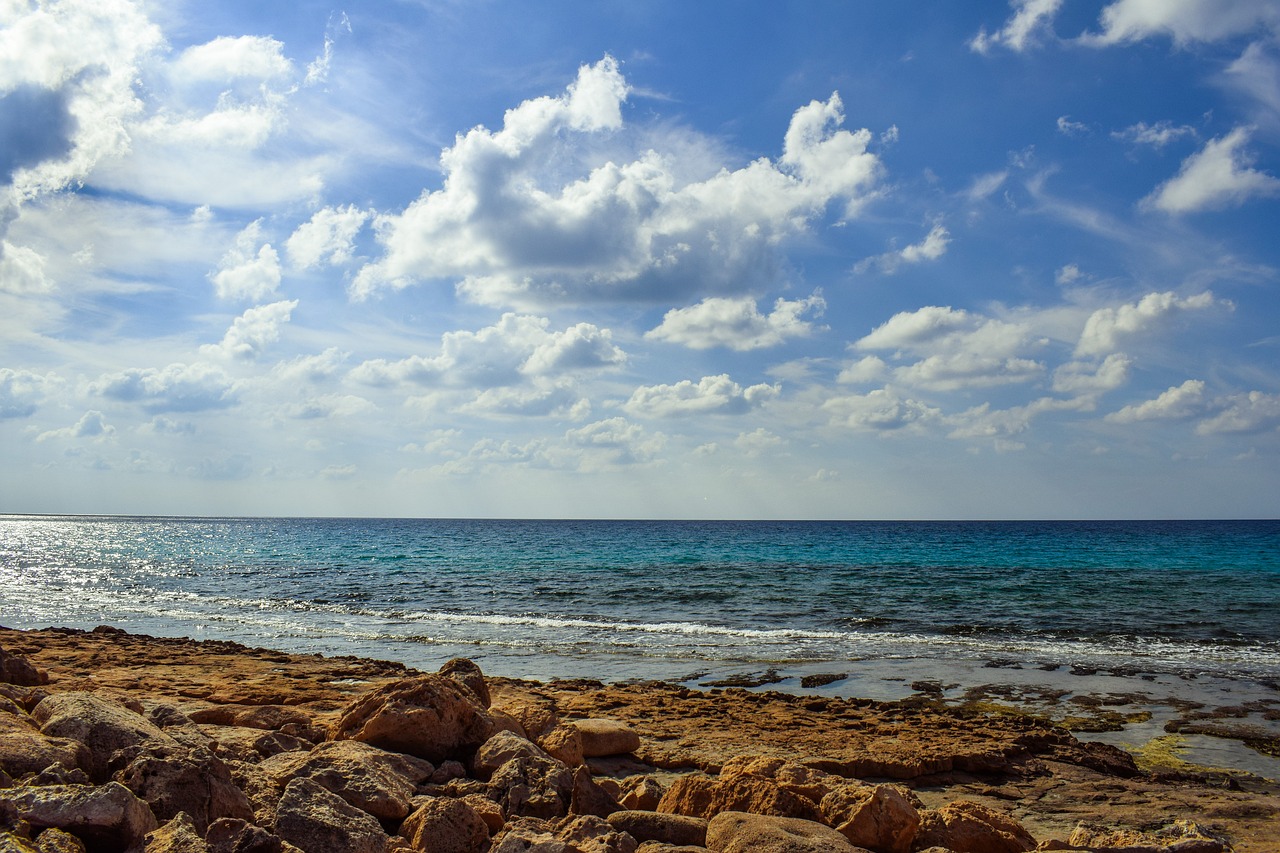 rocky coast sea horizon free photo