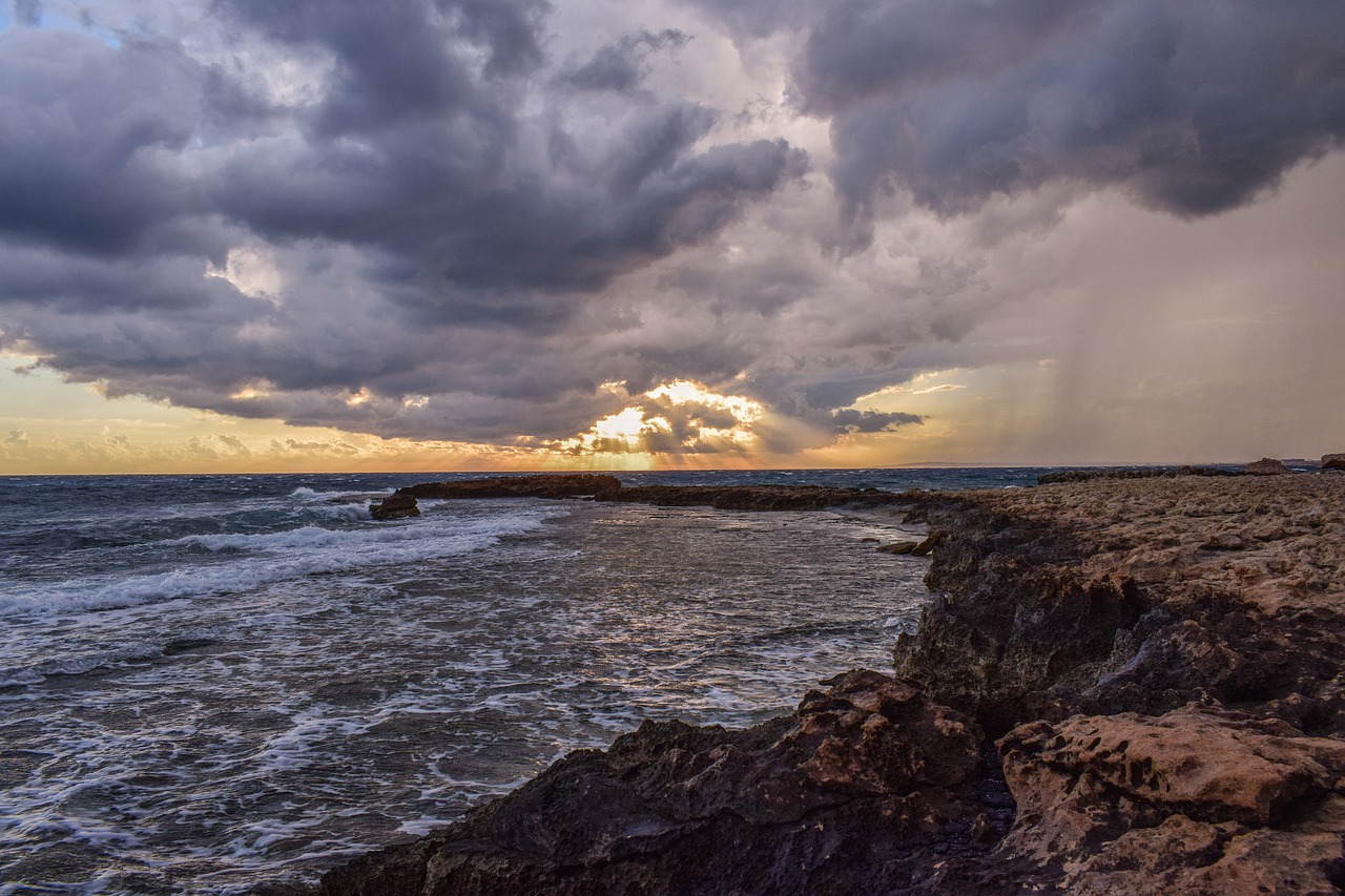 rocky coast sky clouds free photo