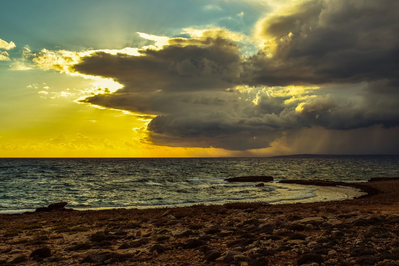 rocky coast sky clouds free photo