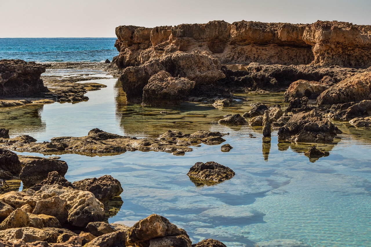 rocky coast water seashore free photo