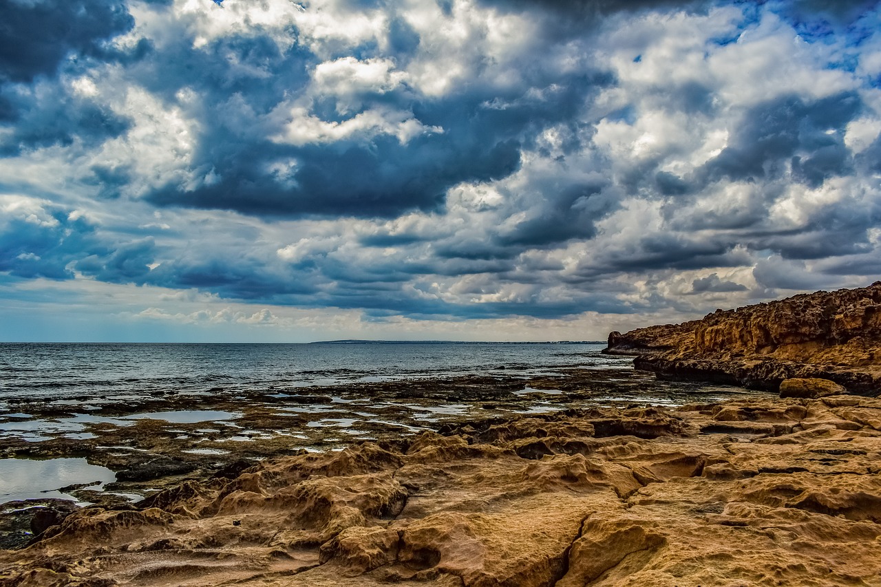 rocky coast  sky  clouds free photo