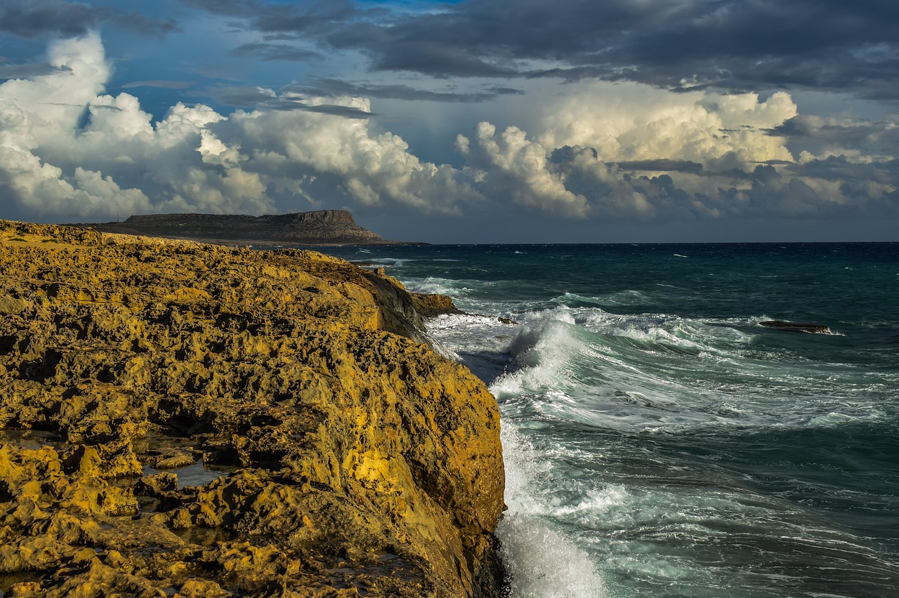 rocky coast  cliff  waves free photo