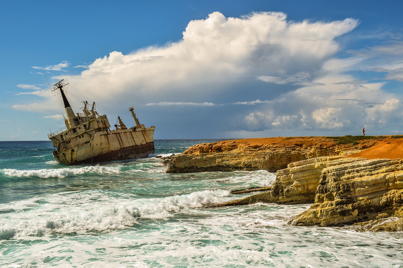 rocky coast  sea  shipwreck free photo
