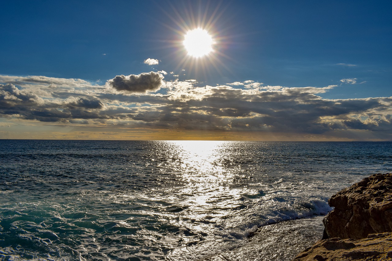 rocky coast  sea  sun free photo