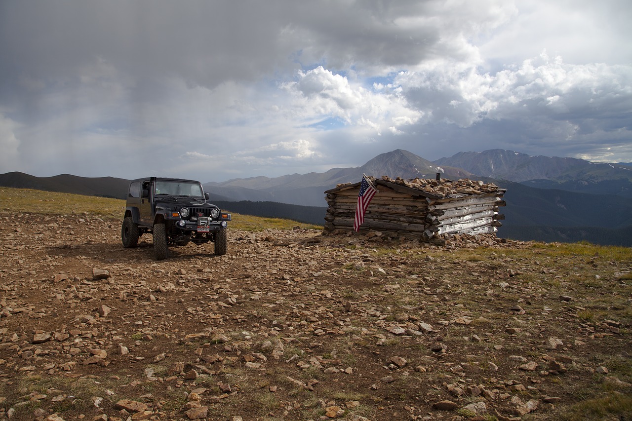 rocky mountains  jeep  american flag free photo