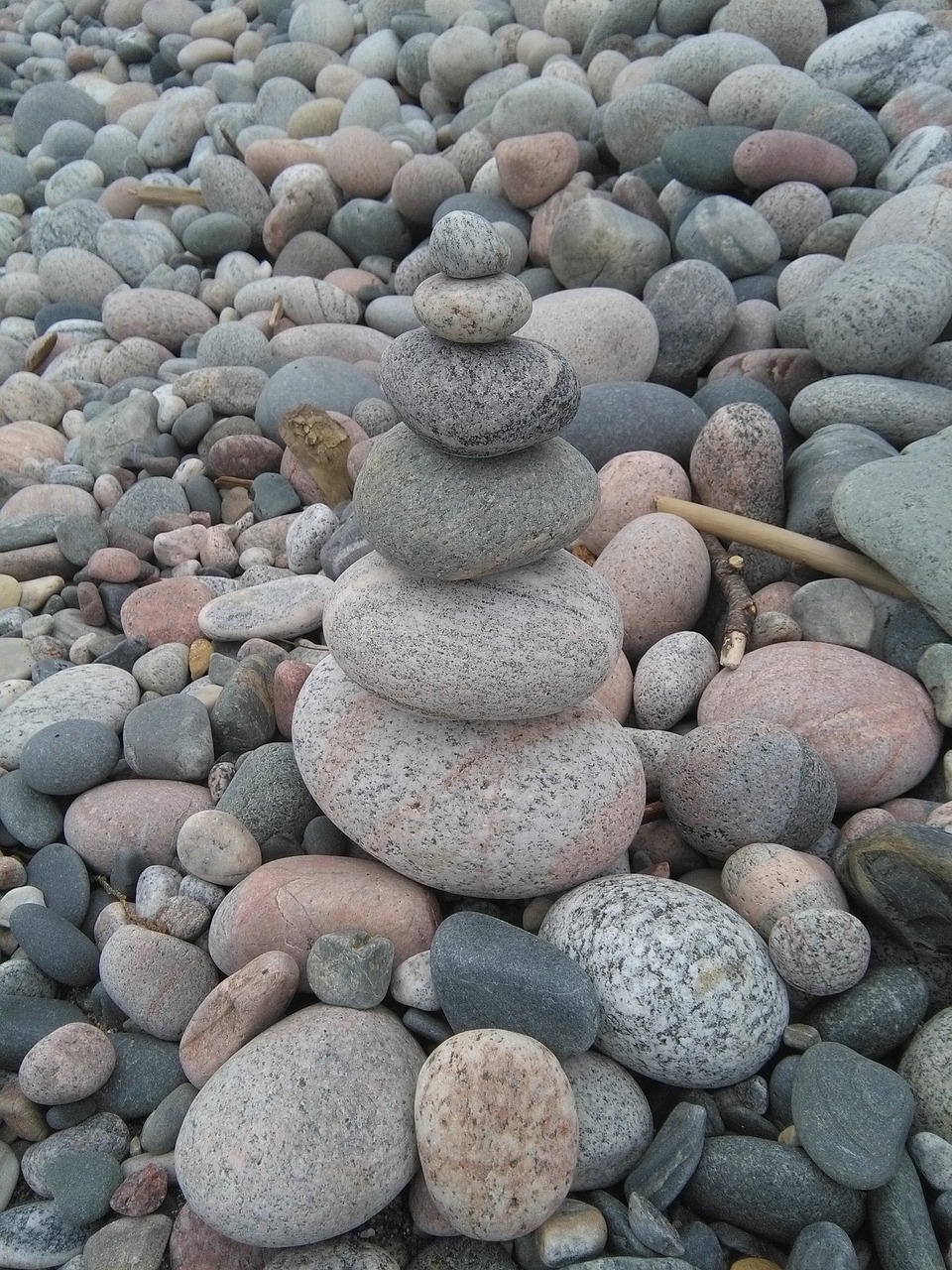 roller pebbles beach free photo