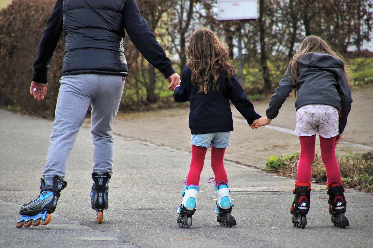 roller skates  sister  rays free photo