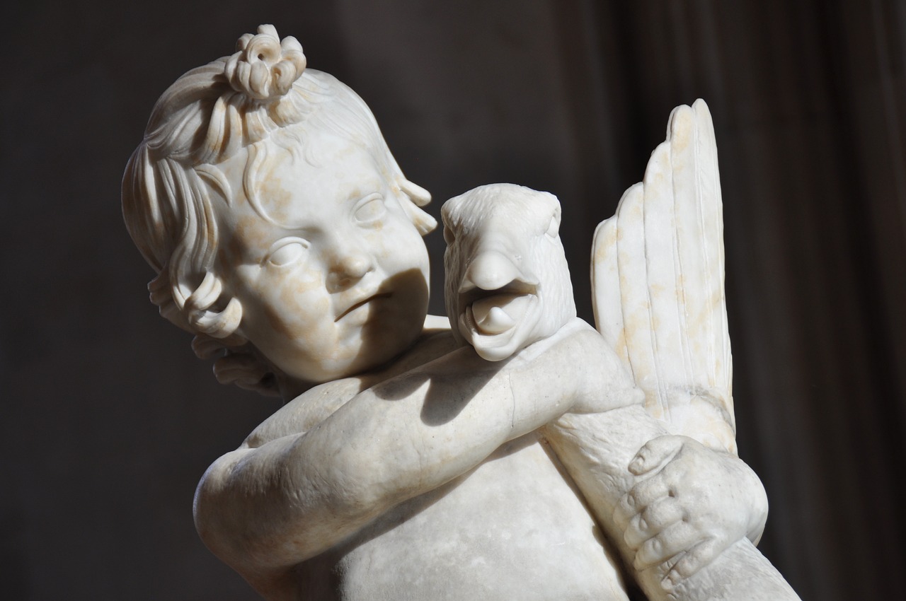 roman antiquities child statue free photo