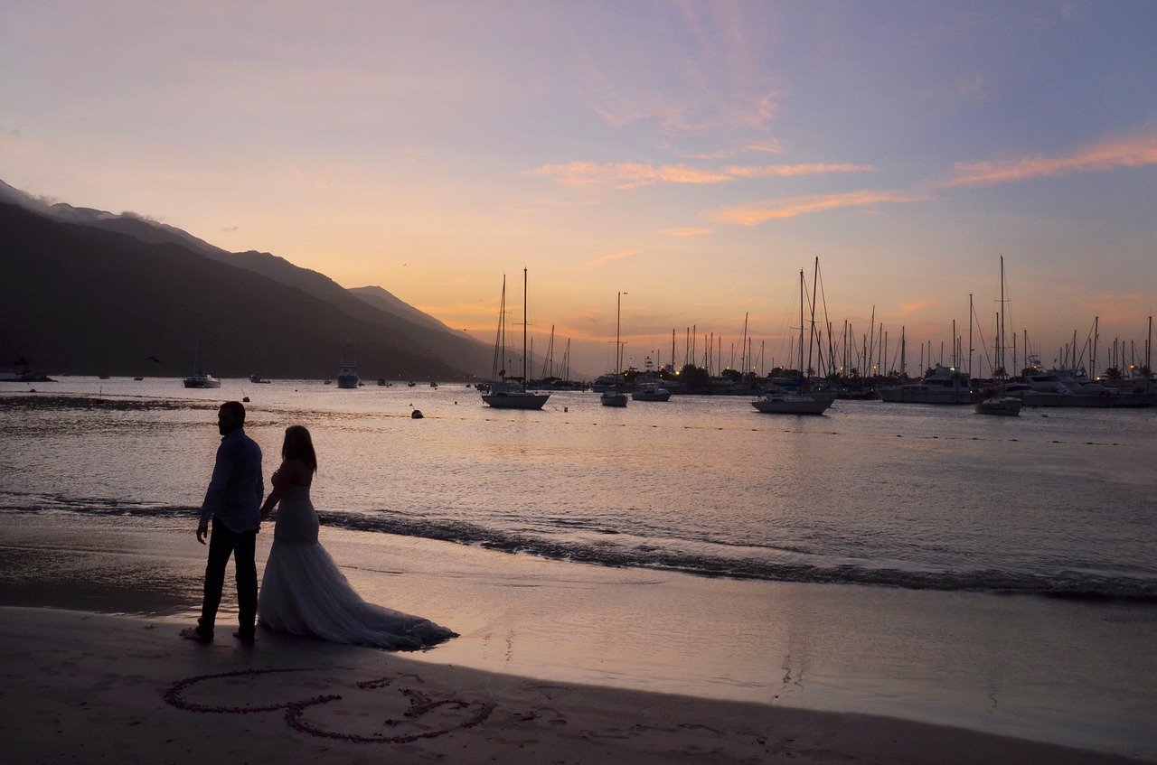 romantic wedding couple the beach sunset free photo