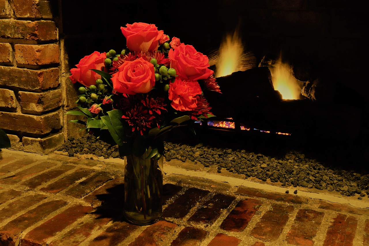 roses  fireplace  bricks free photo