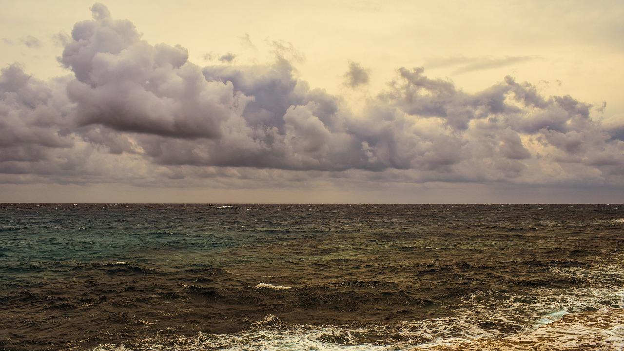 rough sea sky clouds free photo