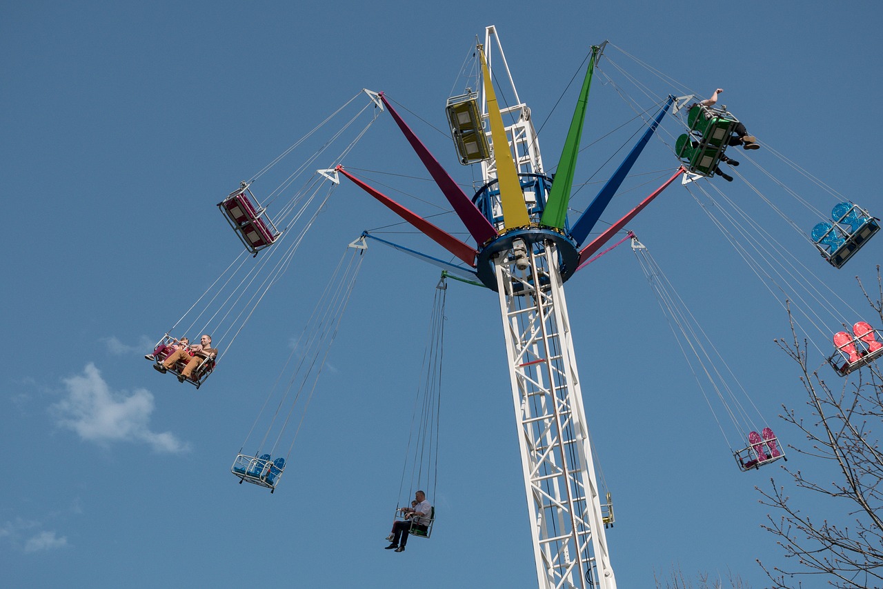 roundabouts  people  carnival free photo