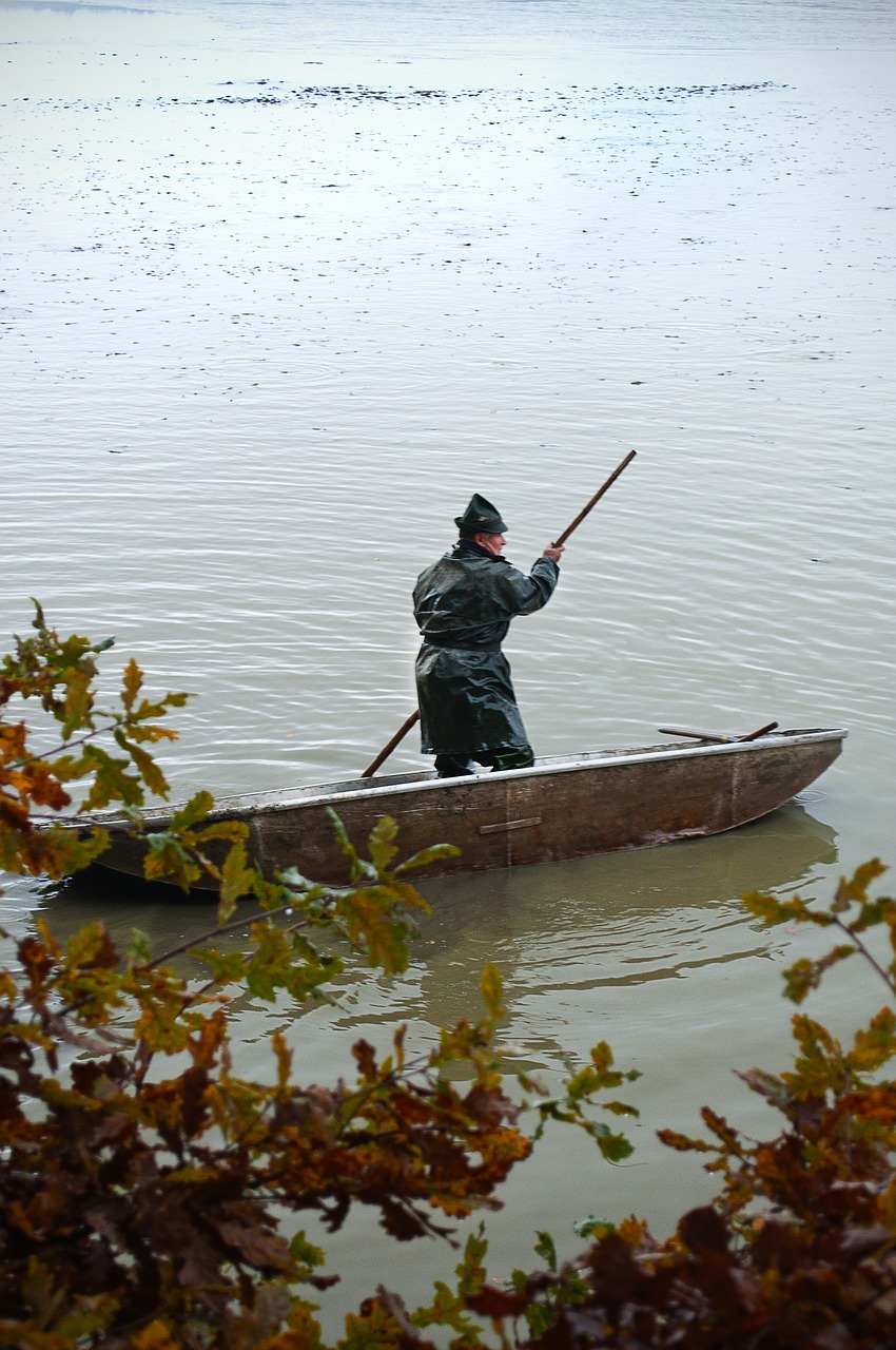 rowboat fisherman one free photo