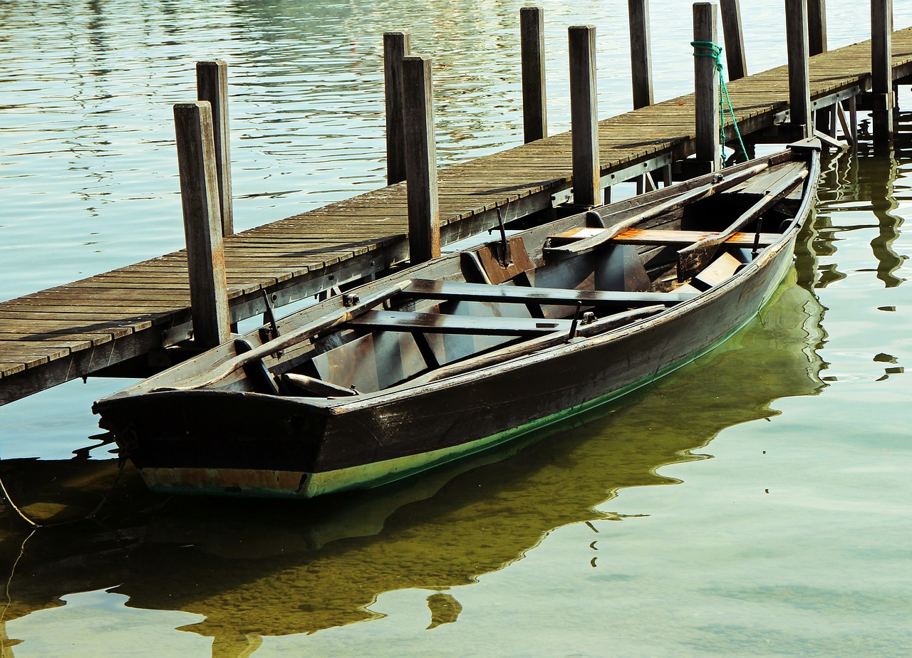 rowing boat boardwalk jetty free photo