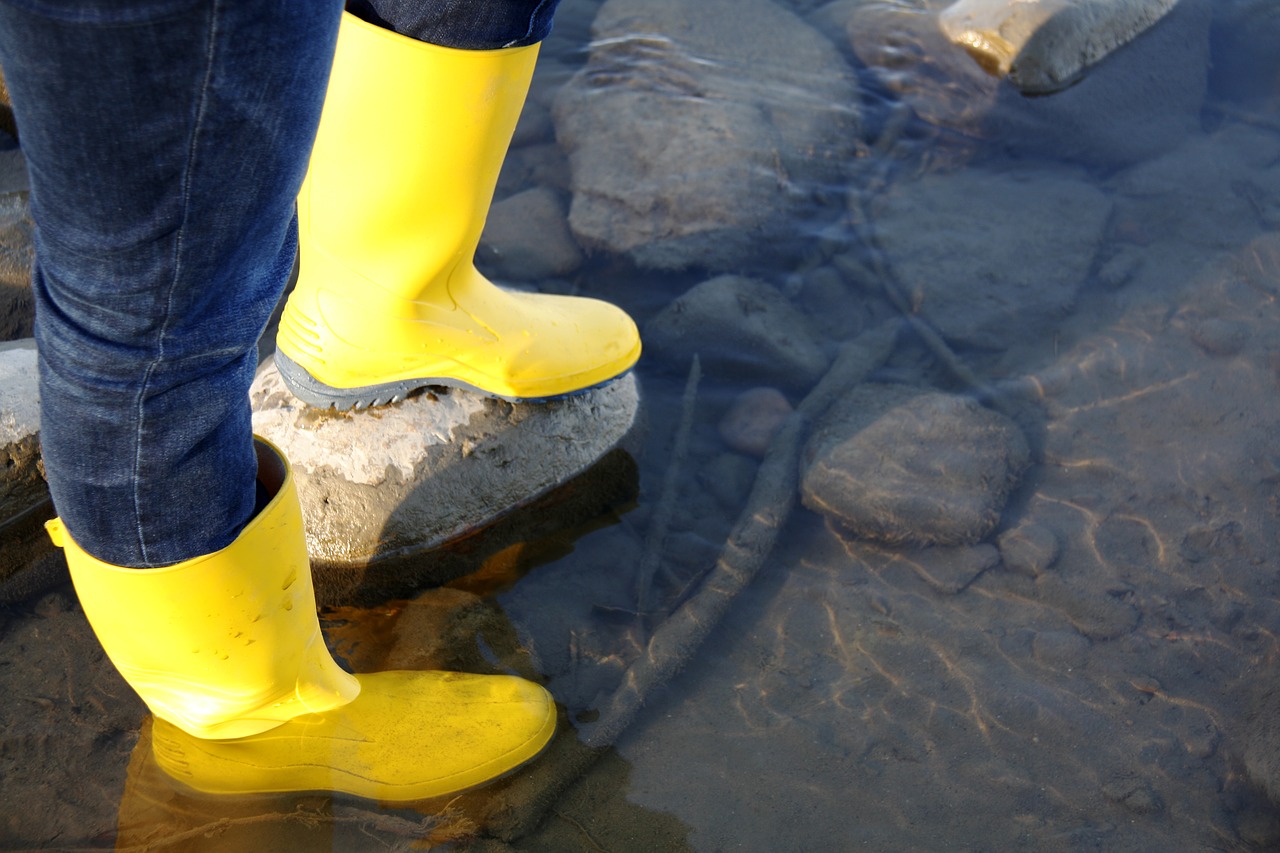 rubber boots in water