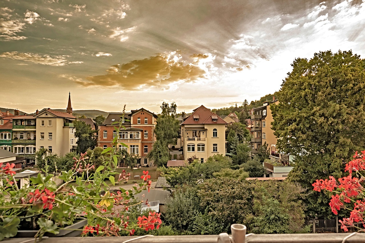 rudolstadt  sunset in the evening  row of houses in the countryside free photo