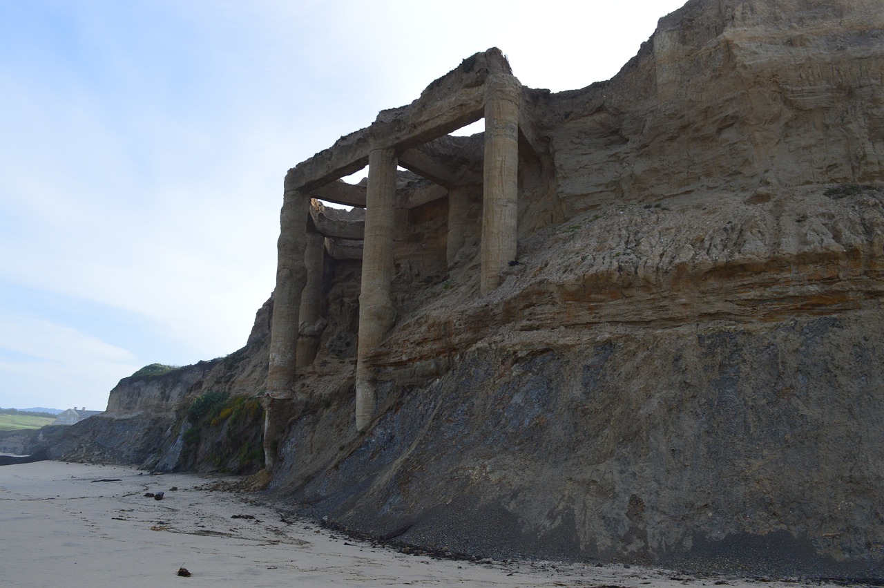 ruins beach cliff free photo