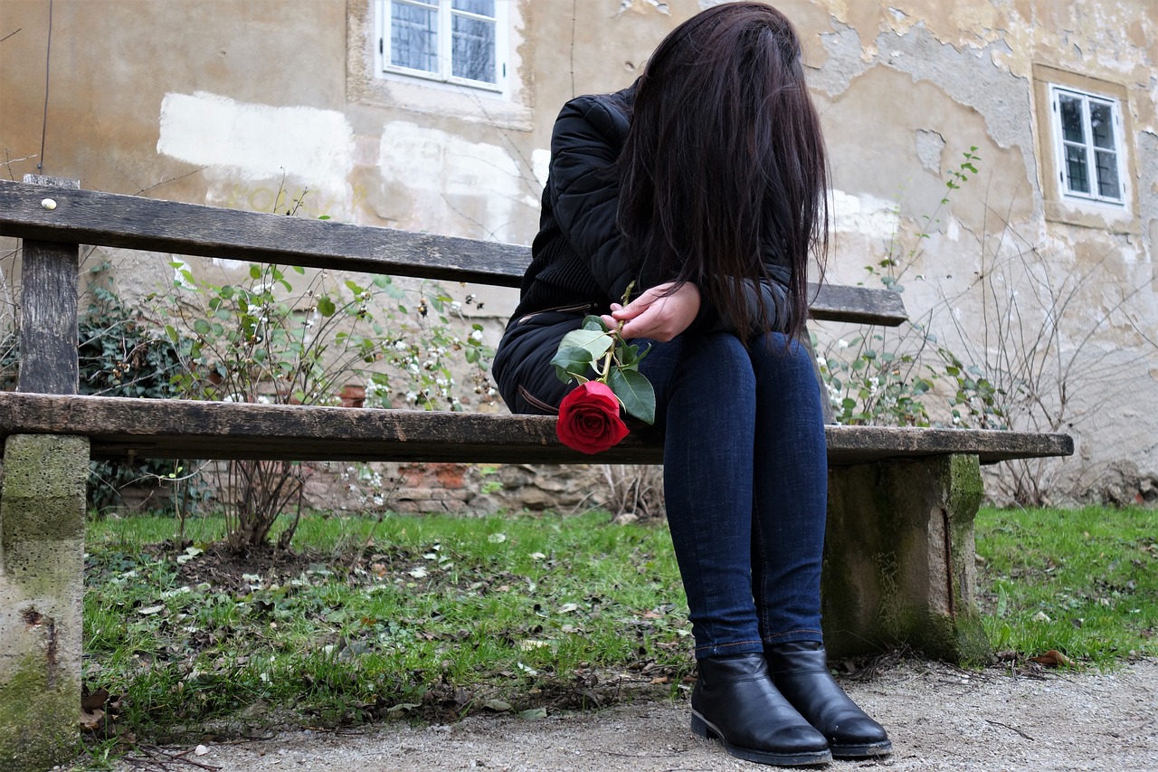 sad girl red rose lonely free photo