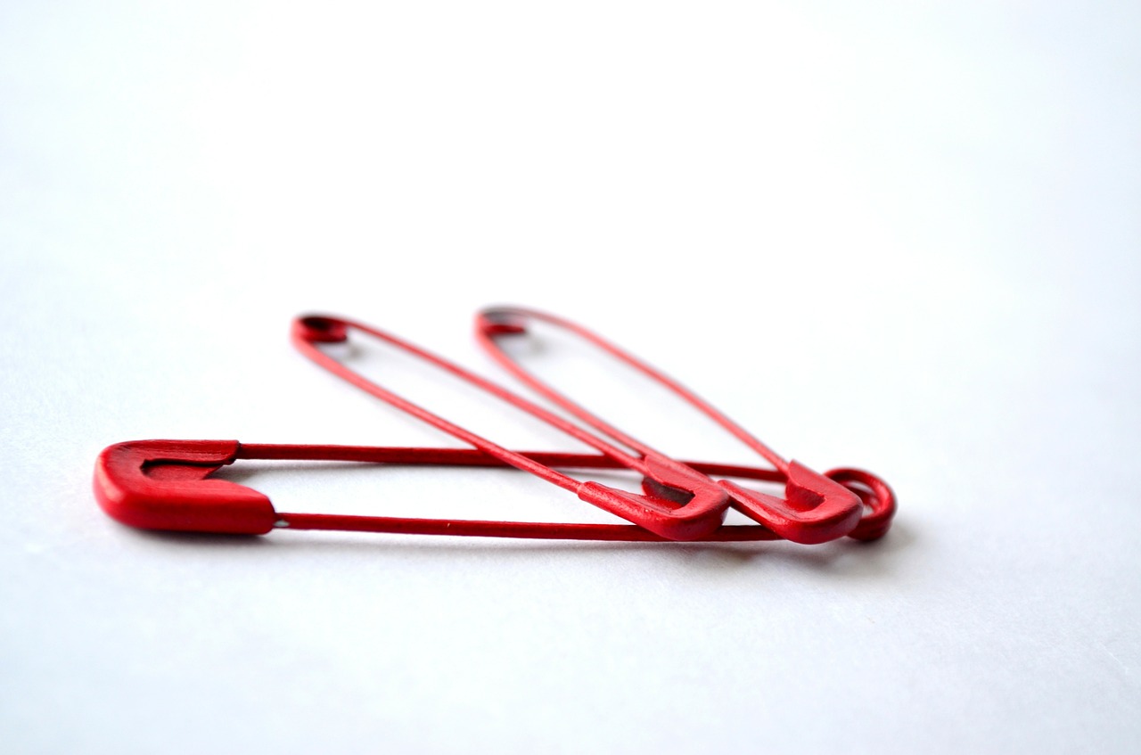safety pins pins red free photo