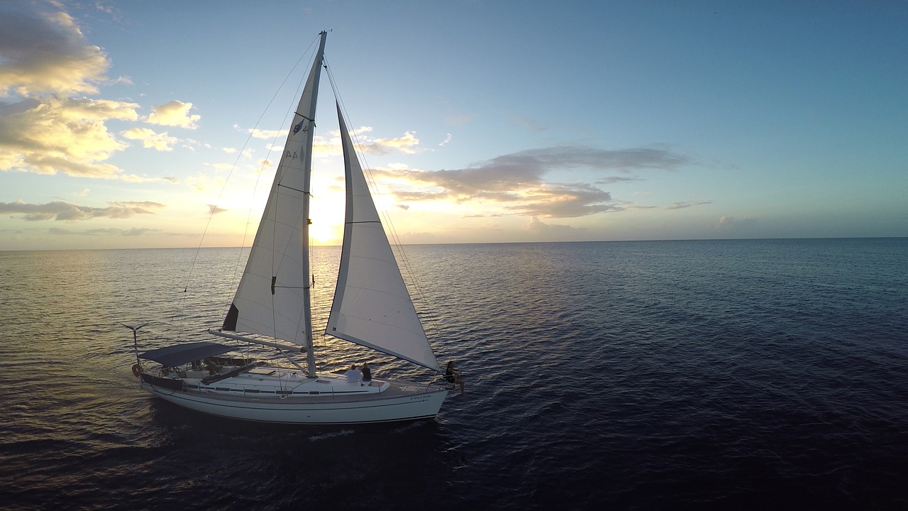 sailboat sunset sea free photo